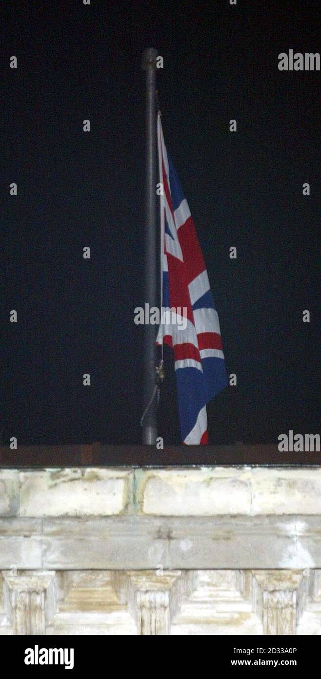 The Union Flag flies over the scene at the British Consulate General's complex in Istanbul, Turkey.  Foreign Secretary Jack Straw condemned the terrorists who killed at least three Britons in a blast at the British consulate in Istanbul as 'fanatics filled with hatred'.  Mr Straw looked ashen-faced as he picked his way around the rubble. Stock Photo