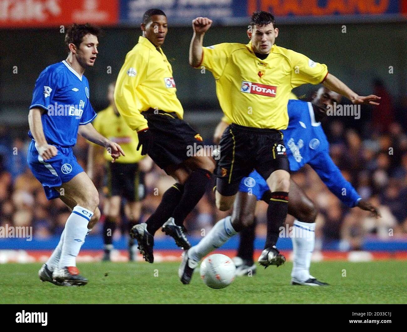 Watfords Jamie Hand forces the ball forward against Chelsea, during their  FA Cup Third Round Replay match at Stamford Bridge, Chelsea. THIS PICTURE  CAN ONLY BE USED WITHIN THE CONTEXT OF AN