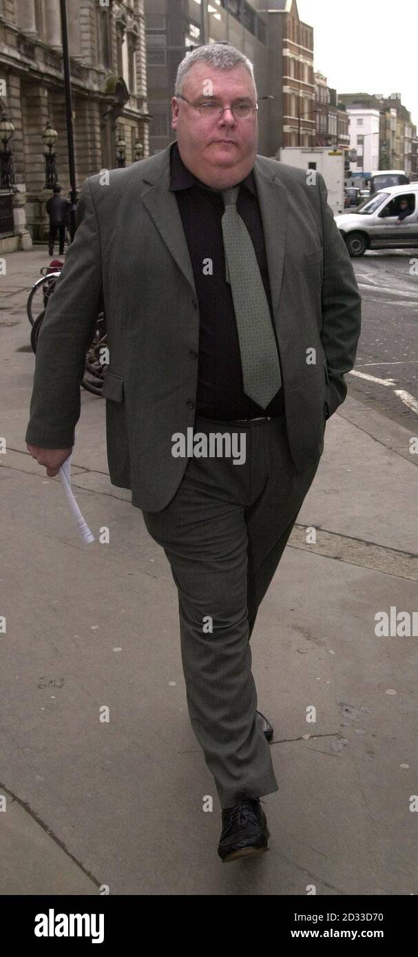 Essex Constabulary Detective Constable Nicholas Thompson, 46, leaves Bow Street Magistrates Court, central London. Thompson is charged with unlawfully disclosing details from sensitive police intelligence records, capable of linking David Lawrenson, the recipient, with illegal drug-dealing activity.  Stock Photo