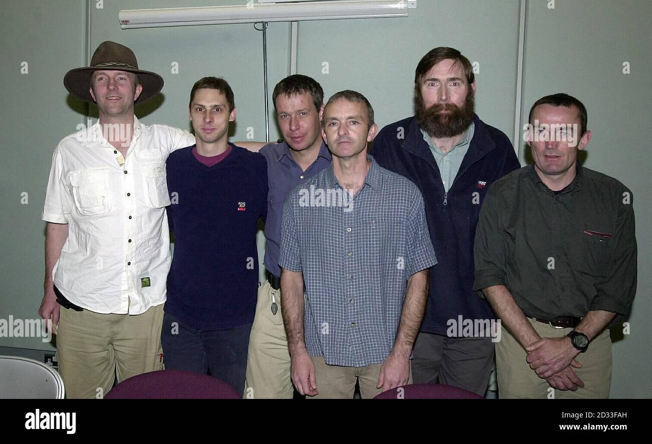 The six British potholers who had to be rescued after they became trapped by rising flood waters in caves at Cuetzalan, north-east of Mexico City, pictured, after they arrived at London's Heathrow Airport. Stock Photo