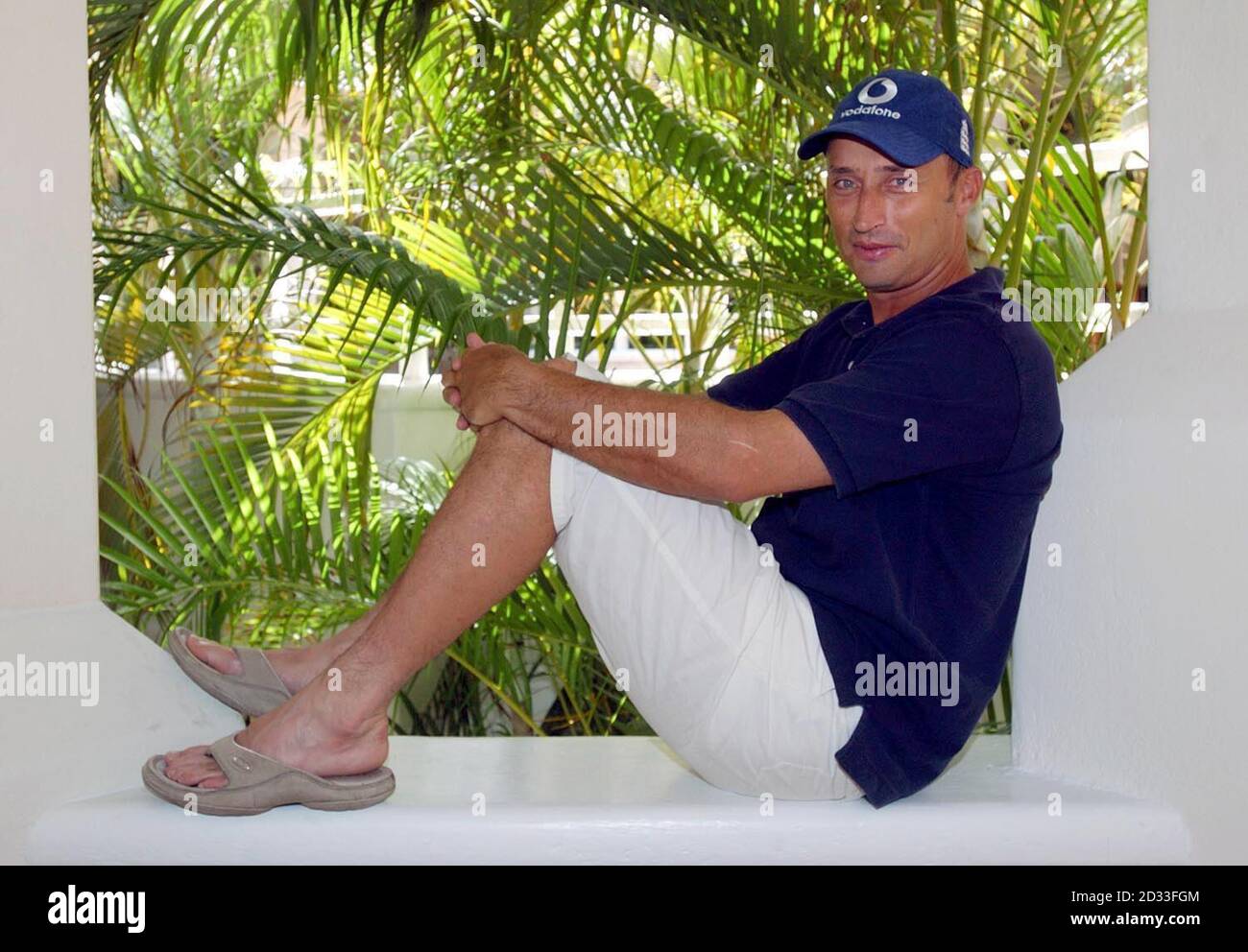 England batsman and former captain Nasser Hussain relaxes at the team hotel, Worthing, Barbados. England have won the Test series against the West Indies, leading 3-0 with the 4th and final match to be played in Antigua on Saturday.  Stock Photo