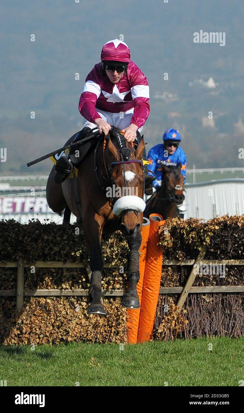 Davy Russell on Tiger Roll as they go on to win The JCB Triumph Hurdle Race during Cheltenham Gold Cup Day at Cheltenham Racecourse, Cheltenham. Stock Photo