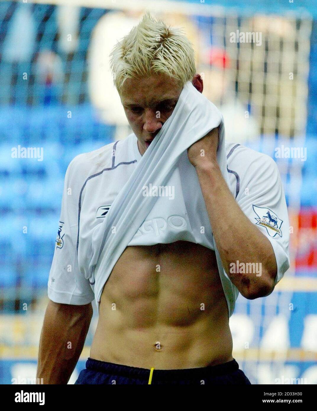 Leeds United's Alan Smith wipes away his tears after the Barclaycard  Premiership match against Bolton Wanderers at the Reebok Stadium, Bolton.  Leeds United have been relegated following their 4-1 defeat. THIS PICTURE