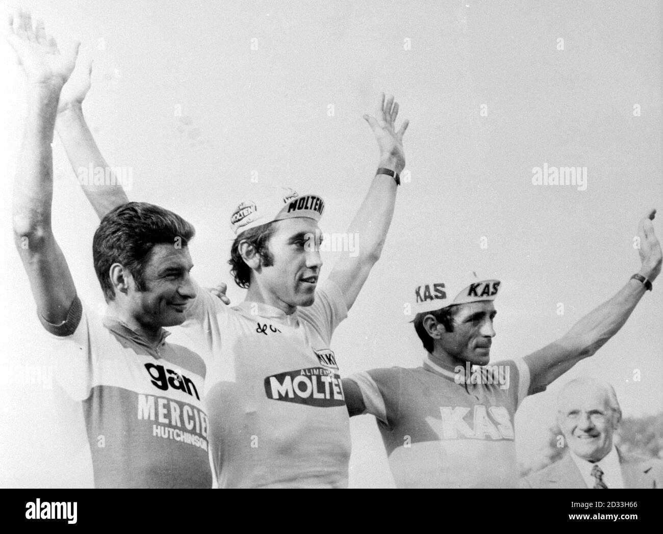 Eddy Merckx (centre) the 29 year old Belgian cyclist celebrates winning the 61st Tour de France ahead of Frenchman Raymond Poulidor (left) and Spain's Lopez Carril (right). Stock Photo