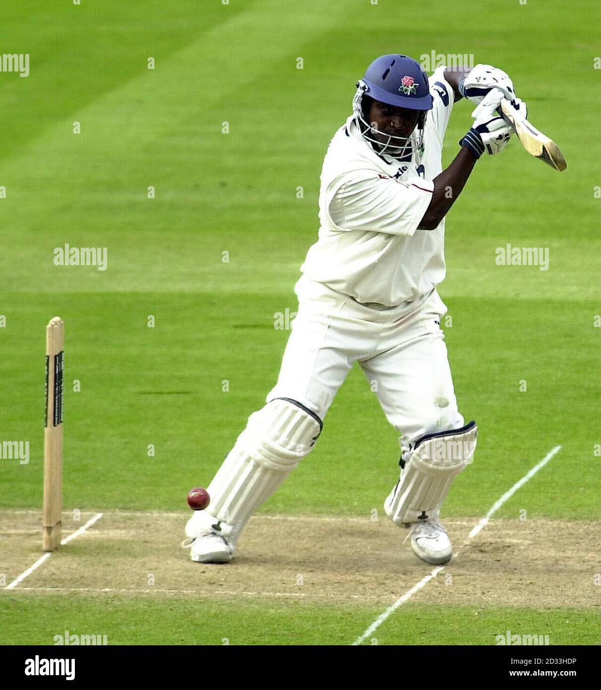 Lancashire's Carl Hooper scores a single off the bowling of Middlesex's Paul Weekes during the Frizzell County Championship match at Lords, St John's Wood, London. Stock Photo