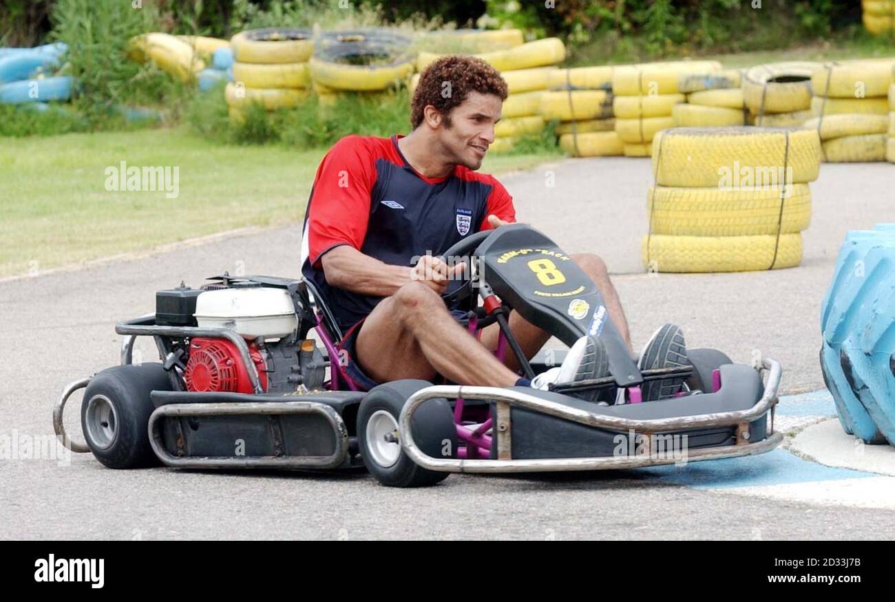England goalkeeper David James takes the corner in his go-kart at the Forte Village Hotel complex in Sardinia. England are in Sardinia in preperation for Euro 2004. Stock Photo