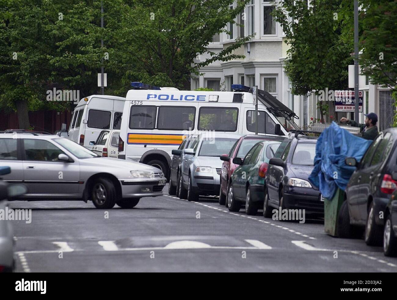 A police van outside the west London home of Muslim cleric Abu Hamza who was arrested early, on an extradition warrant issued by the US government. He will appear at Bow Street Magistrates Court, sitting at Belmarsh, later in the day. Stock Photo