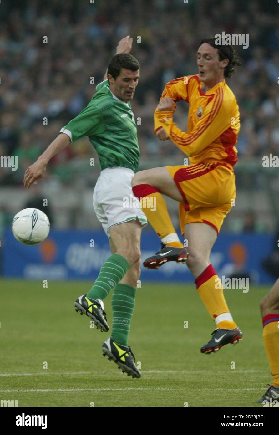 Ireland player, Roy Keane (left) and Romania's  Soava Costin contest possession, during their International friendly  at Lansdowne Road, Dublin.  Stock Photo