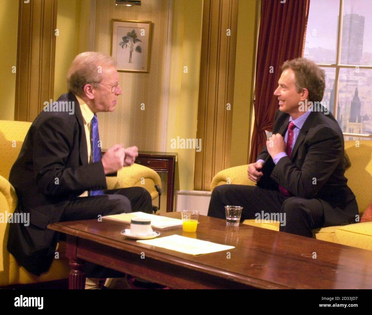Prime Minister Tony Blair (right) speaks with David Frost on the BBC's Breakfast With Frost programme. Stock Photo