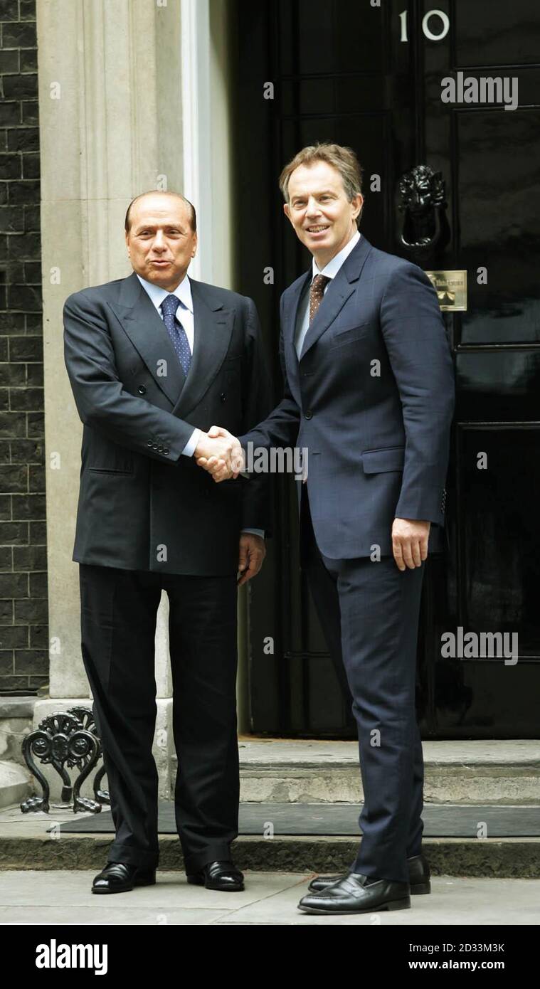 British Prime Minister Tony Blair (right) greets his Italian ...