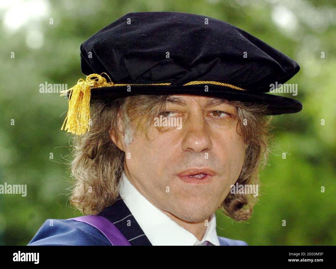 Rock star and Philanthropist Sir Bob Geldof waits to collect an honorary Doctorate in Civil Law at the University of East Anglia, Norwich. Stock Photo