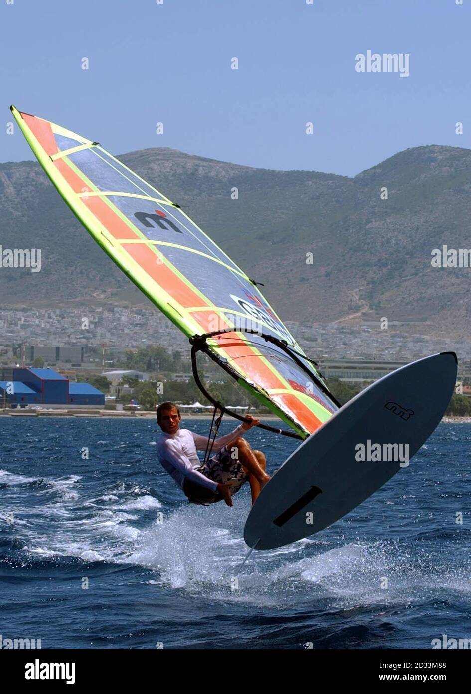 Norwich born Nick Dempsey on the water during the Royal Yachting Association's olympic team preview day at their base in Athens, Greece. Nick will compete in the Mistral class at the Athens 2004 olympics as part of the Great Britain sailing team.  Stock Photo