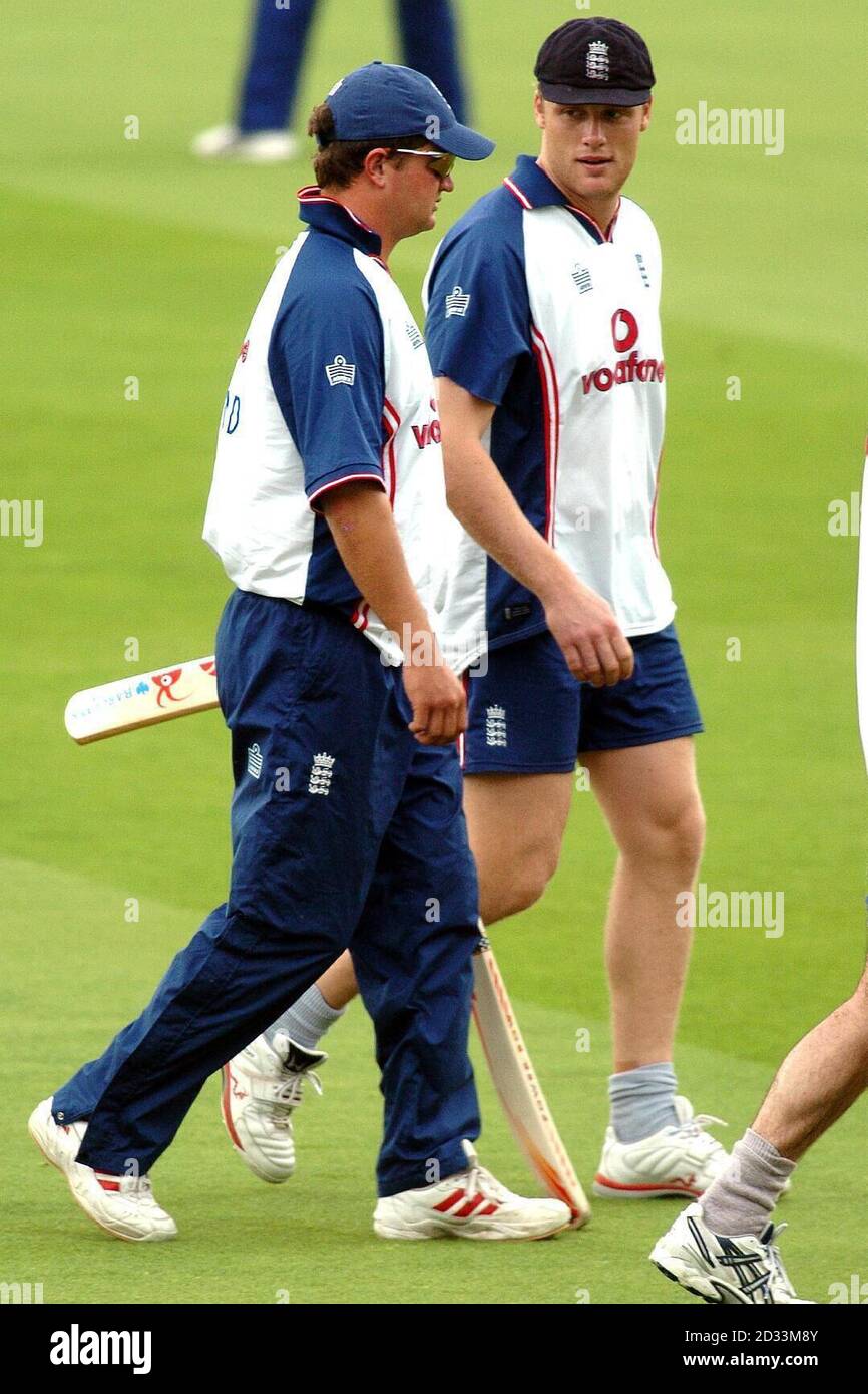 Andrew Flintoff (right) with Robert Key on the way to net practice at Lord's before the first test match against the West Indies on Thursday at Lord's. Stock Photo