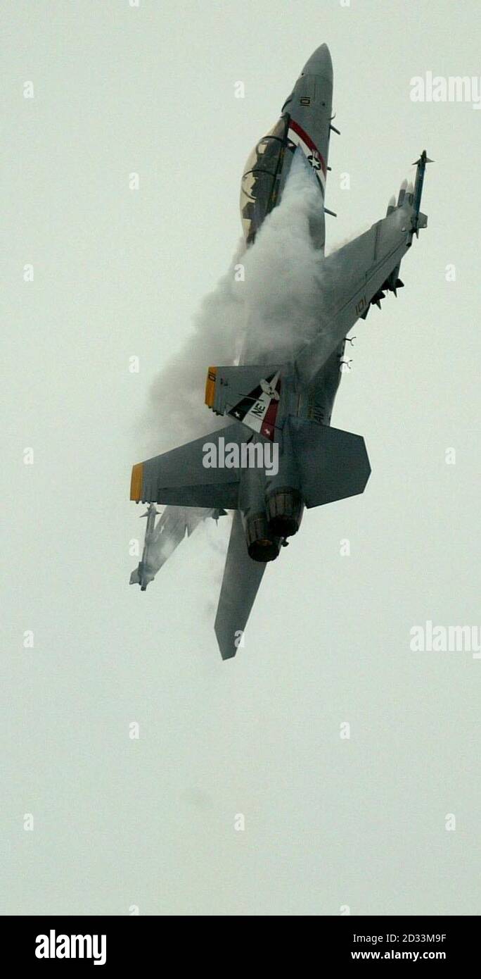 A US Navy Boeing F/A 18F in action at the Farnborough International Airshow in Hampshire. Stock Photo
