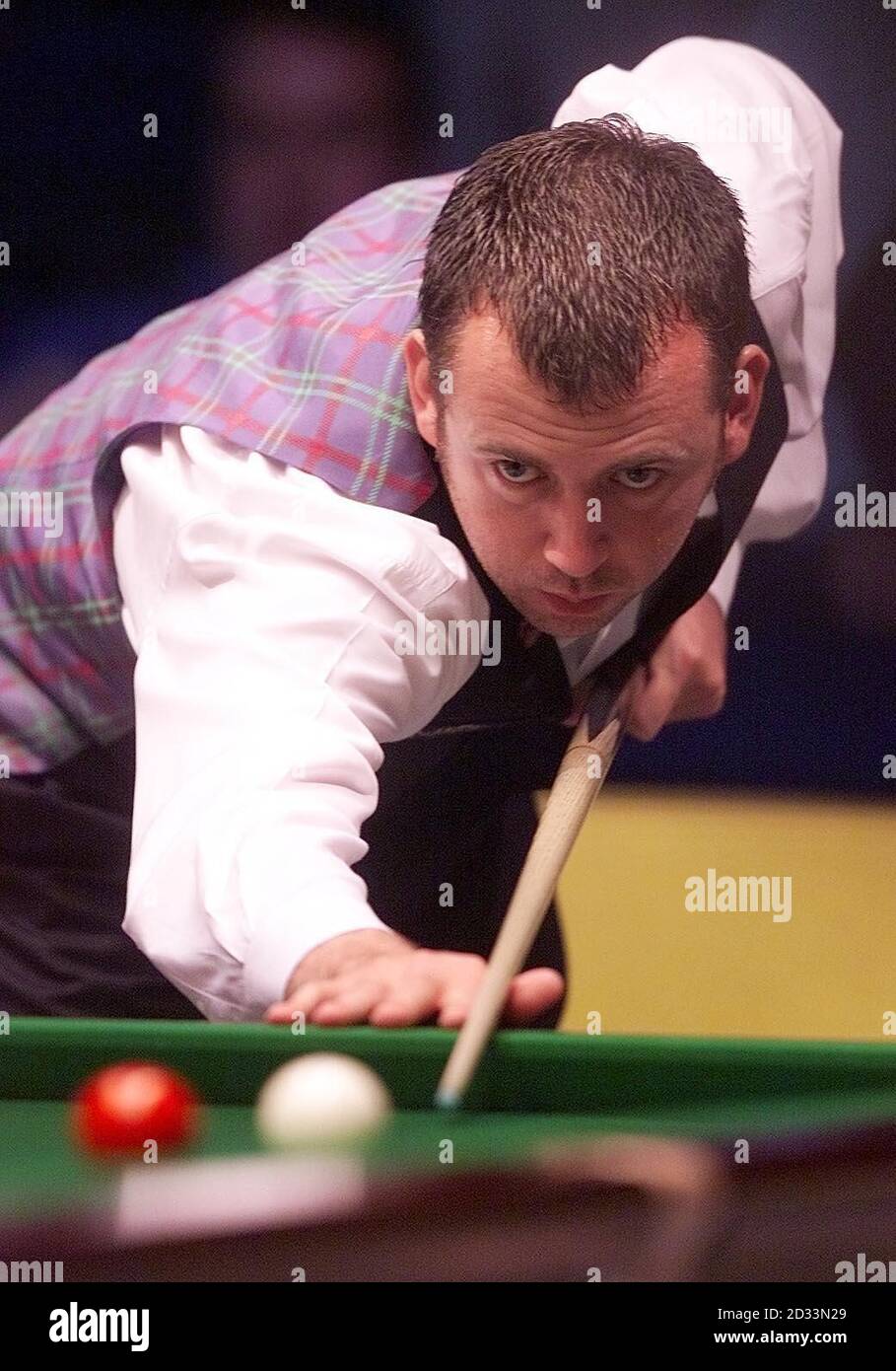 Mark Williams in action against Ali Carter during the Stan James British Open, at the Telewest Arena, Newcastle