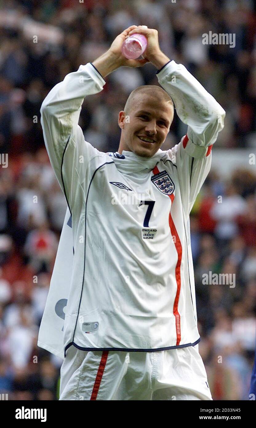 England's David Beckham celebrates the draw against Greece which was enough to take them to the World Cup finals during the FIFA World Cup European Qualifying Group Nine match at Old Trafford, Manchester.  eg Stock Photo