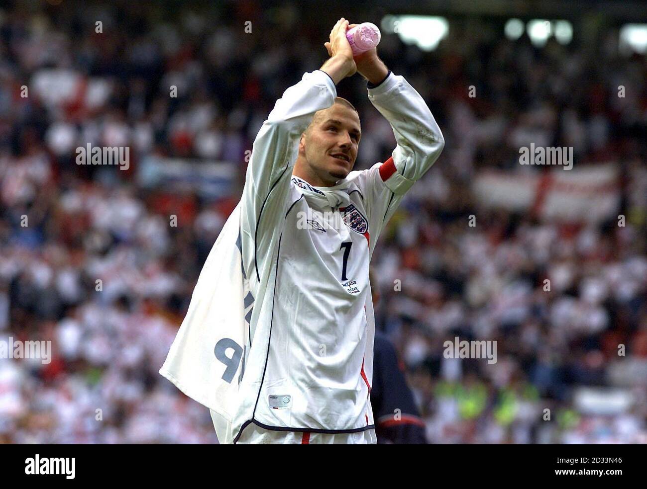 England's David Beckham celebrates the draw against Greece which was enough to take them to the World Cup finals during the FIFA World Cup European Qualifying Group Nine match at Old Trafford, Manchester.  eg Stock Photo