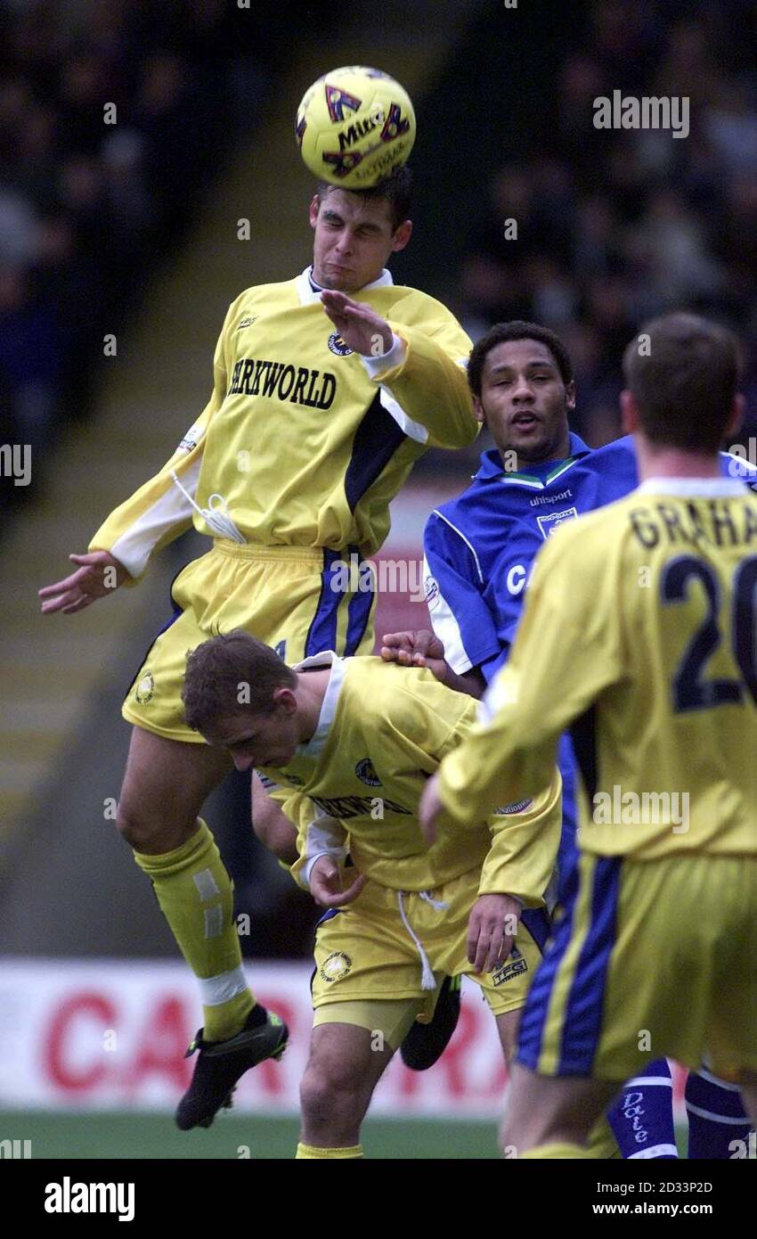 Torquay's Sean Hankin jumps for the ball during the Nationwide Division Three game at Spotland, Rochdale. THIS PICTURE CAN ONLY BE USED WITHIN THE CONTEXT OF AN EDITORIAL FEATURE. NO UNOFFICIAL CLUB WEBSITE USE. Stock Photo