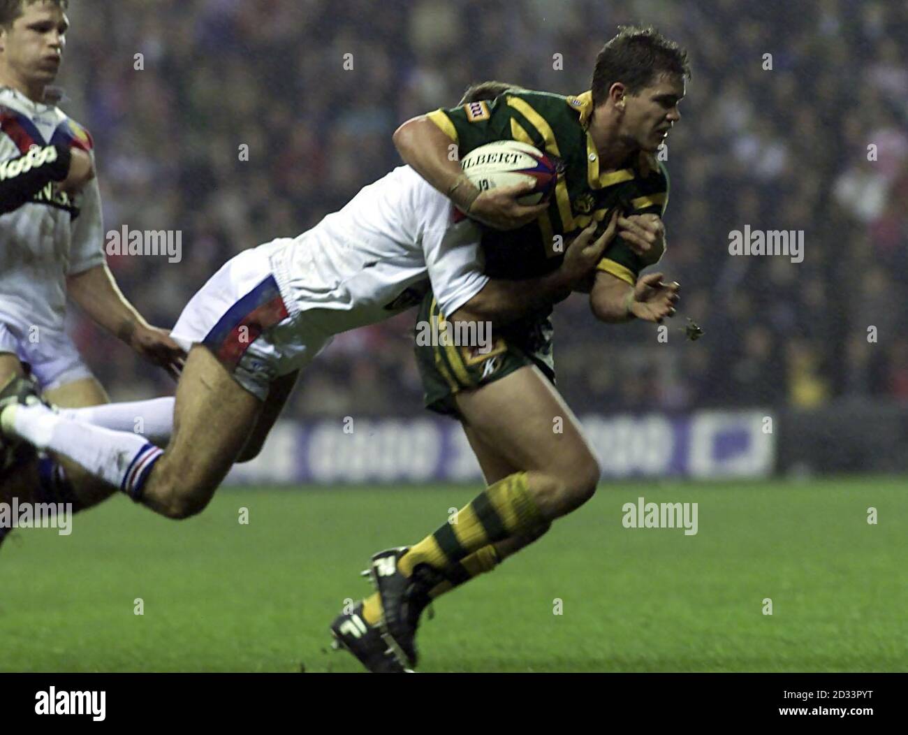 Great Britain's Paul Johnson is unable to stop Australia's Andrew Johns ...