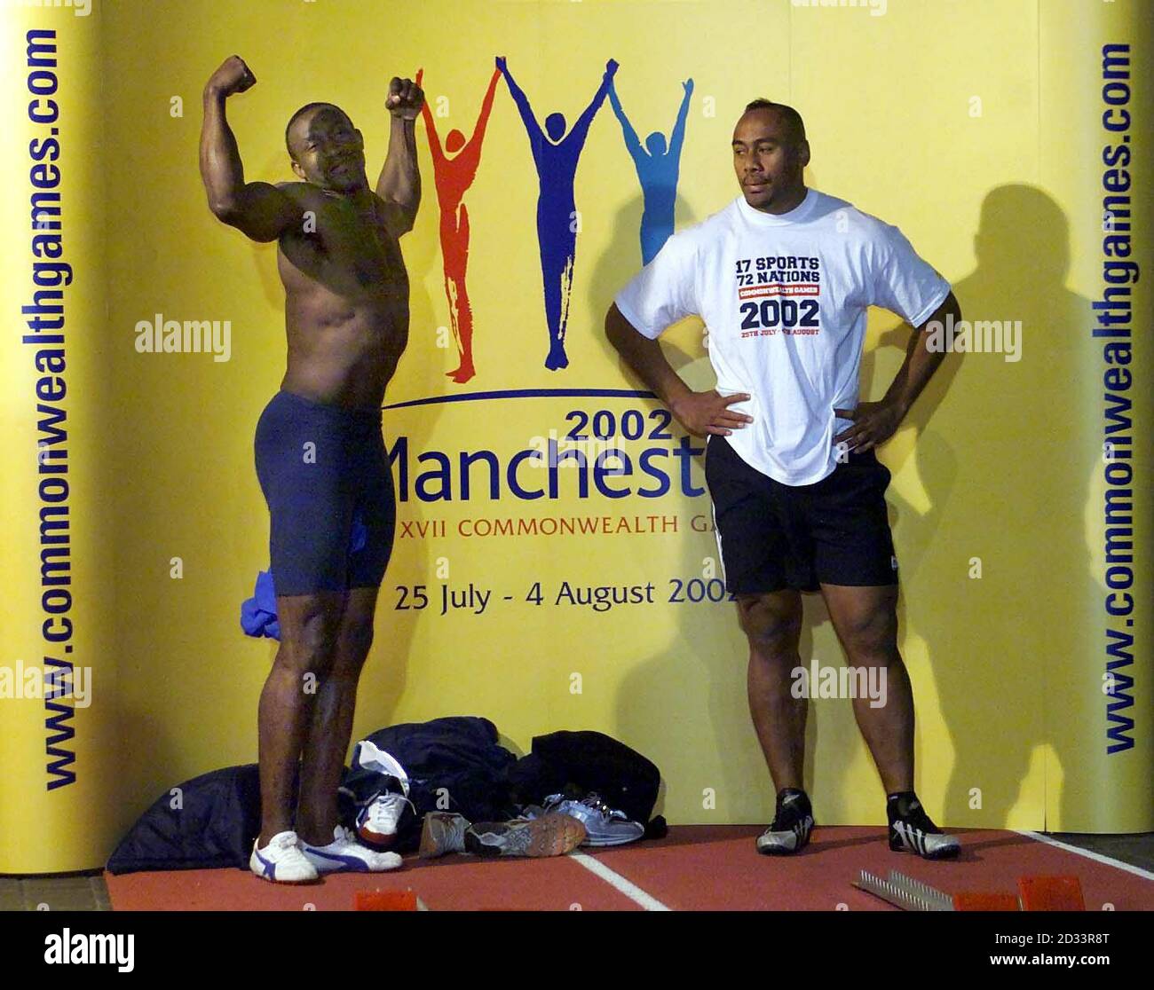 https://c8.alamy.com/comp/2D33R8T/linford-christie-flexes-his-muscles-as-jonah-lomu-r-looks-on-whilst-promoting-the-commonwealth-games-t-shirt-at-the-printworks-manchester-new-zealand-all-blacks-lomu-took-on-former-olympic-gold-medalist-christie-in-a-head-to-head-sprint-what-christie-won-as-part-of-the-countdown-towards-the-2002-commonwealth-games-2D33R8T.jpg
