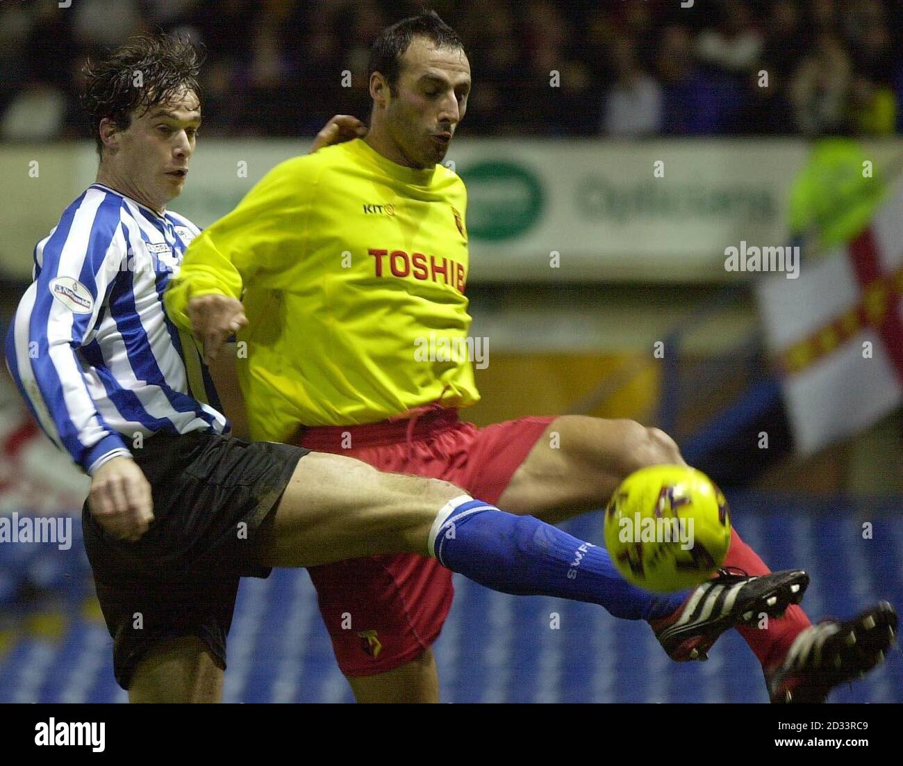 Sheffield Wednesday's Gerald Sibon (left) and Watford's Ramon Vega during the Worthington Cup, Quarter Final, clash at Hillsborough. THIS PICTURE CAN ONLY BE USED WITHIN THE CONTEXT OF AN EDITORIAL FEATURE. NO WEBSITE/INTERNET USE UNLESS SITE IS REGISTERED WITH FOOTBALL ASSOCIATION PREMIER LEAGUE. Stock Photo