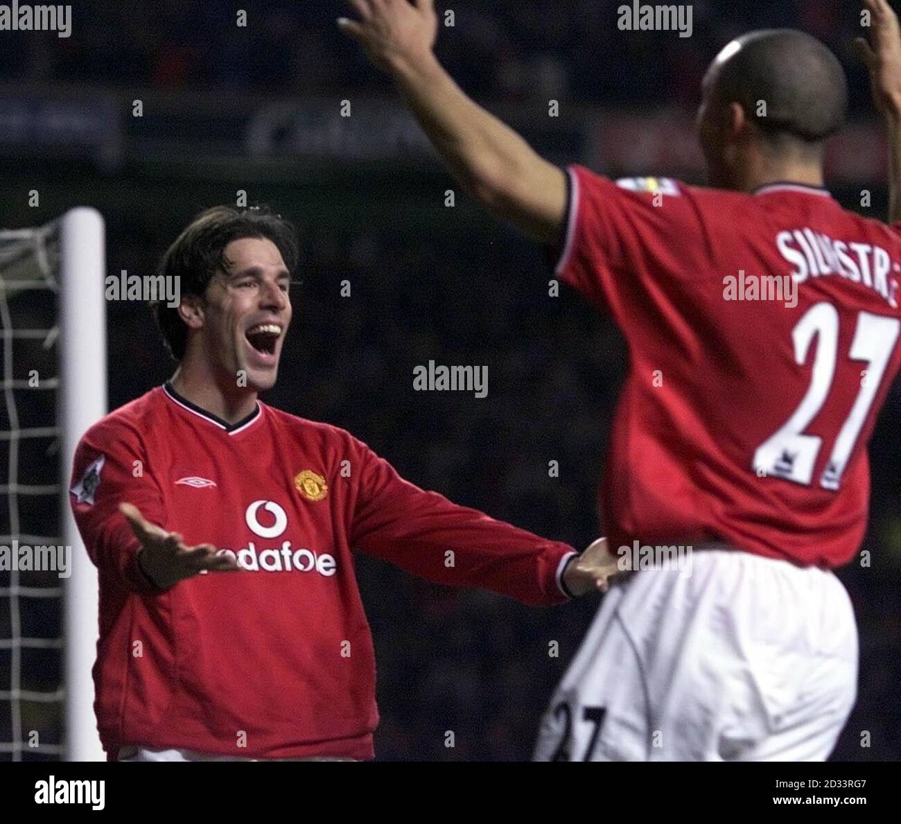 PLEASE READ FULL ADVISORY AT END OF CAPTION. Manchester United's Ruud Van Nistelrooy celebrates his goal with teammate Mikael Silvestre during their FA Barclaycard Premiership match against Newcastle United at Old Trafford.  THIS PICTURE CAN ONLY BE USED WITHIN THE CONTEXT OF AN EDITORIAL FEATURE. NO WEBSITE/INTERNET USE OF PREMIERSHIP MATERIAL UNLESS SITE IS REGISTERED WITH FOOTBALL ASSOCIATION PREMIER LEAGUE. Stock Photo