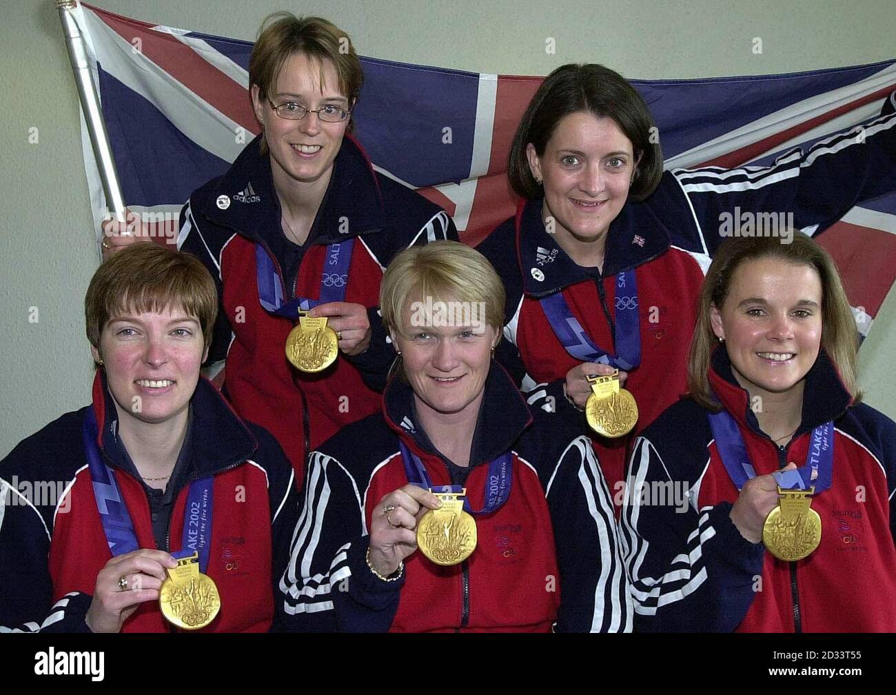 Great Britain's Curling team: Margaret Morton, Janice Rankin, Rhona Martin, Debbie Knox and Fiona Macdonald,  arrive at London's Heathrow Airport, holding the Gold Medals that they won during the Winter Olympics at Salt Lake City.   *14/06/02 Great Britain's Curling team: Margaret Morton, Janice Rankin, Rhona Martin, Debbie Knox and Fiona Macdonald who has been made MBEs (Members of the Order of the British Empire) in the Queen's Birthday Honours for services to the sport.  Stock Photo