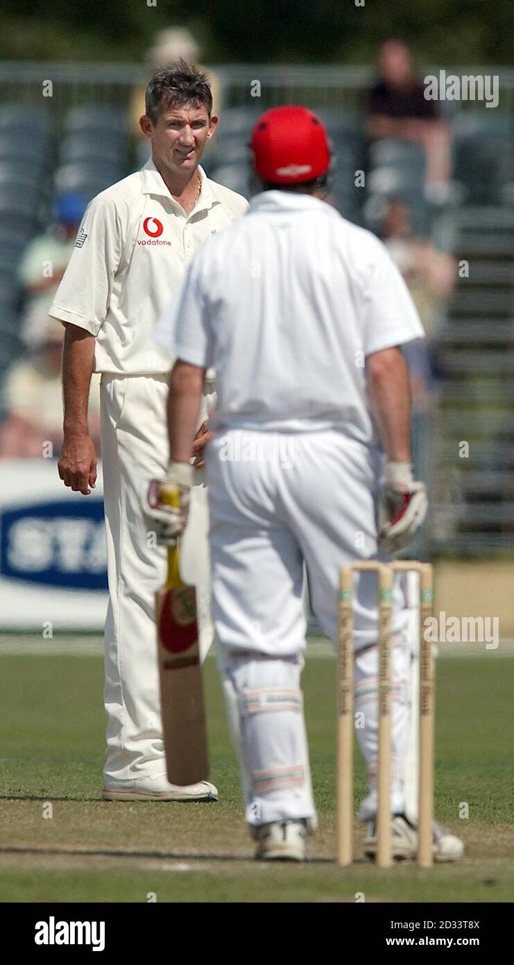 England bowler Andrew Caddick (left) stares at Canterbury's Robbie Frew during the third and final day of their friendly match at Hagley Park, Christchurch, New Zealand,. The match ended in a draw.   Stock Photo