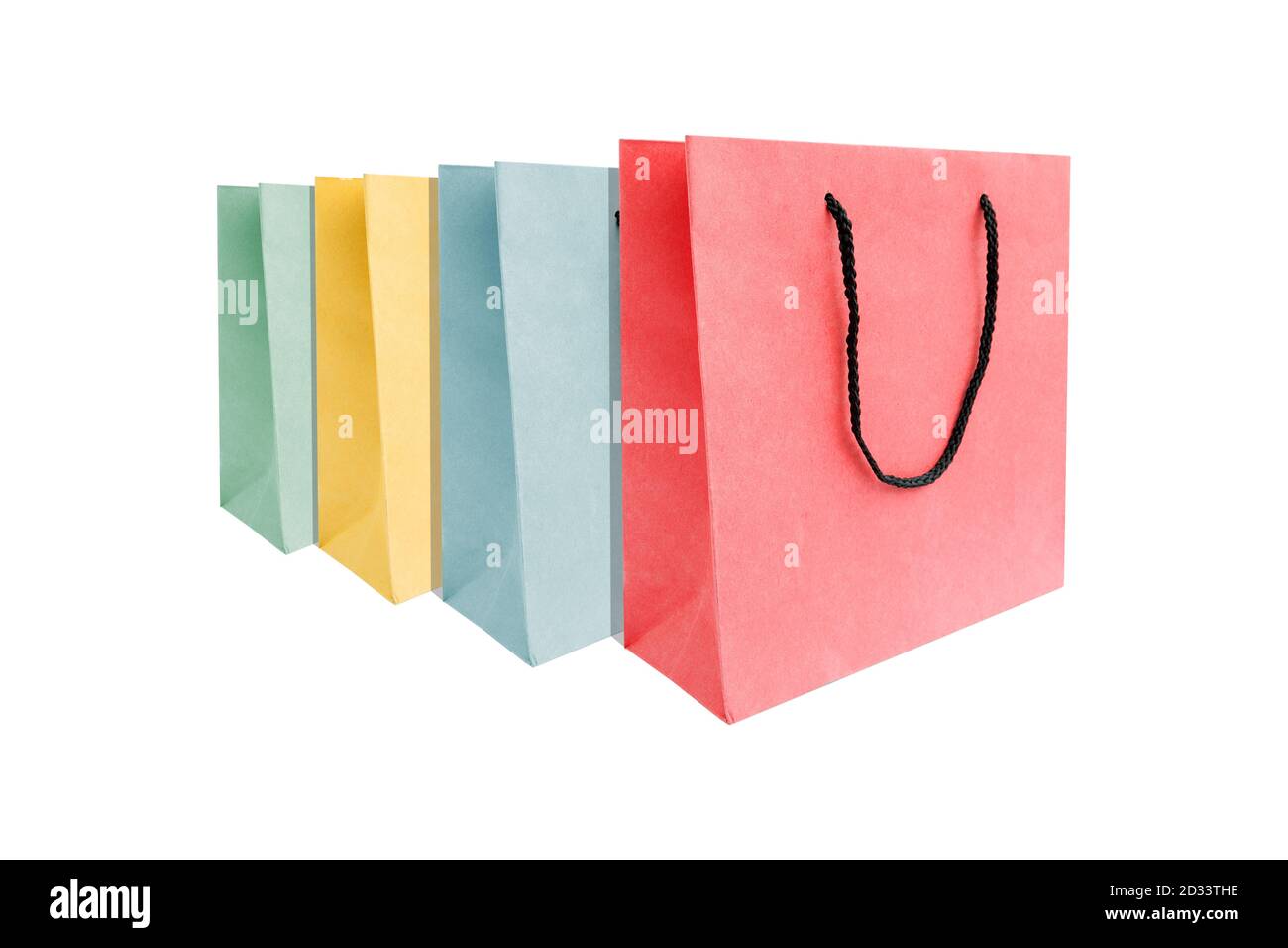 Group of multi colored of paper shopping bags isolated on white background. Stock Photo