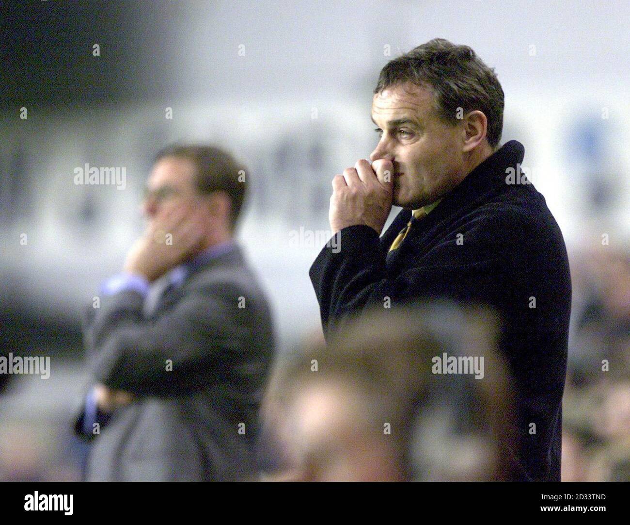 Dejected Wolverhampton Wanderers Manager Dave Jones (right) watches his team lose to Millwall 1-0  during their Nationwide Division One match at the New Den, London. THIS PICTURE CAN ONLY BE USED WITHIN THE CONTEXT OF AN EDITORIAL FEATURE. NO UNOFFICIAL CLUB WEBSITE USE. Stock Photo