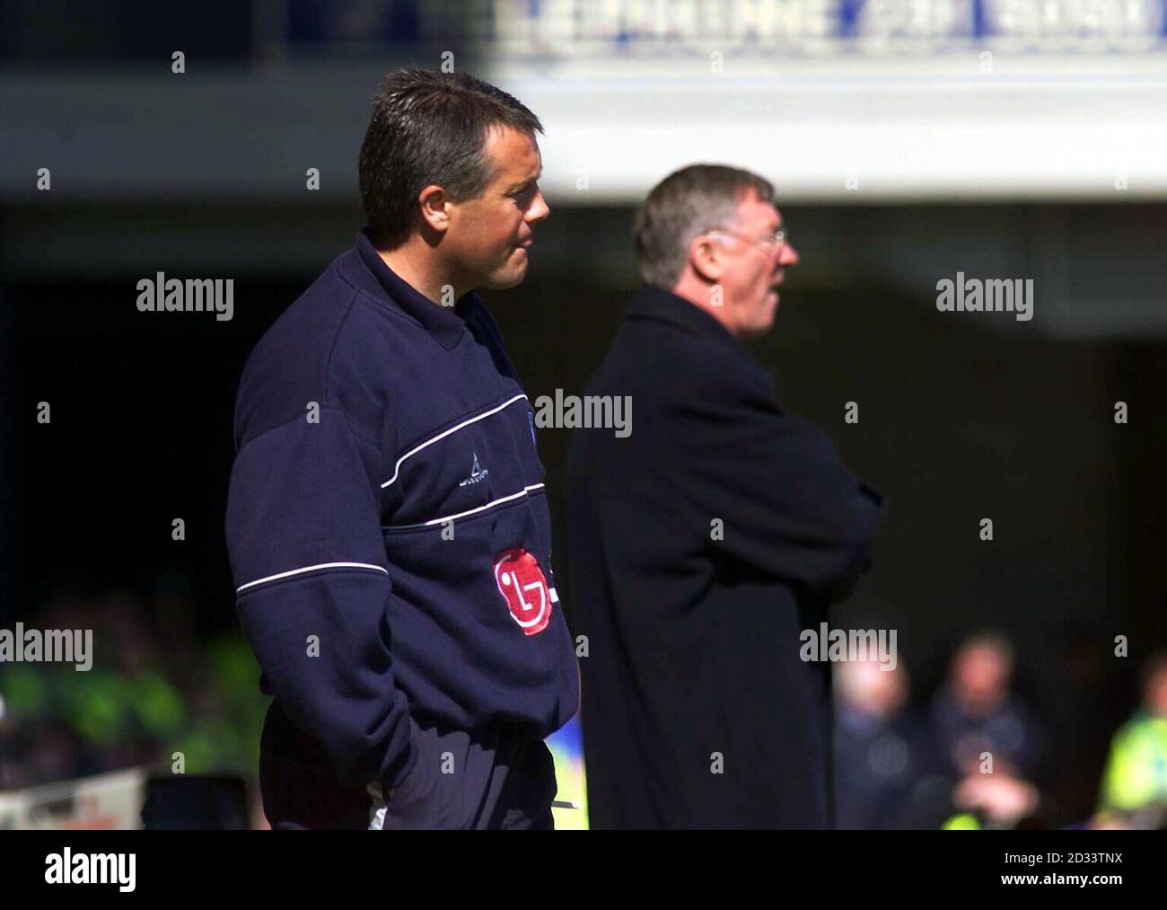 Leicester City's assistant manager Micky Adams (left) and Manchester United's manager Alex Ferguson look on during the FA Barclaycard Premiership match at Leicester's Filbert Street stadium. Micky Adams is to succeed current Leicester manger Dave Basset as Leicester City's new manager from Monday. Stock Photo