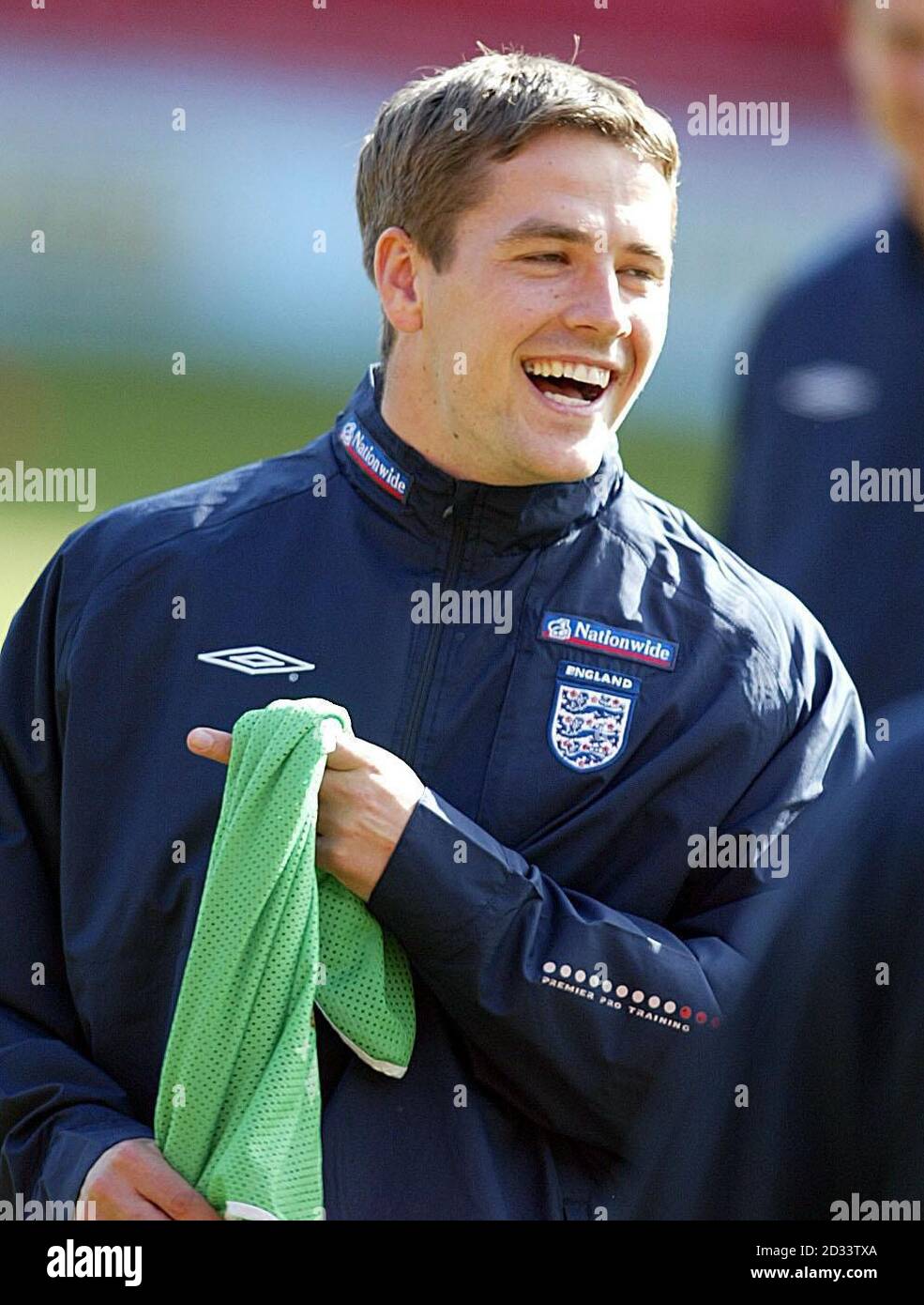 Stand-in England captain Michael Owen smiles during a training session