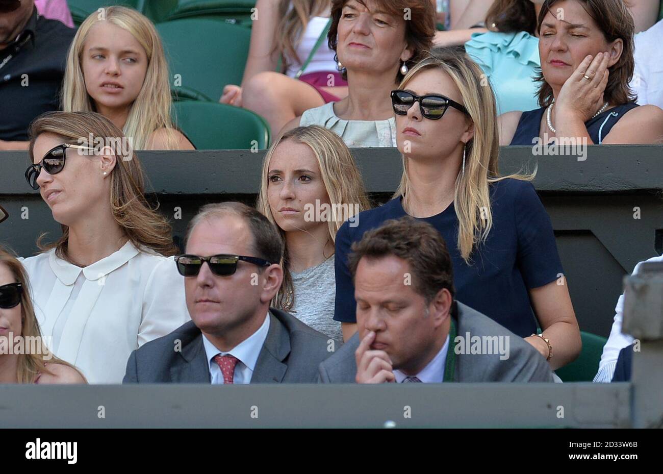 Maria Sharapova watches her boyfriend Grigor Dimitrov in his Semi Final  against Serbia's Novak Djokovic on Centre Court during day twelve of the  Wimbledon Championships at the All England Lawn tennis and, image size:1300x929