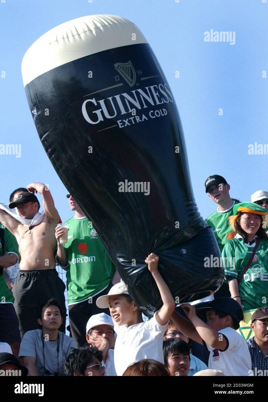 Young Japanese Fans Carry A Huge Inflatable Guinness Pint As They Watch The Ireland Against Japanese Club Side Hiroshima Warm Up Game At The Newly Opened Hamayama Sports Park In Izumo Japan