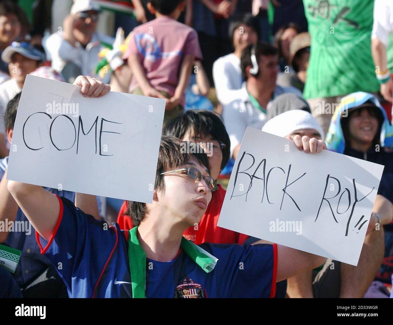 A Japanese Fan Holds A Message In Support Of Roy Keane During The Ireland Against Japanese Club Side Hiroshima Warm Up Game At The Newly Opened Hamayama Sports Park In Izumo Japan