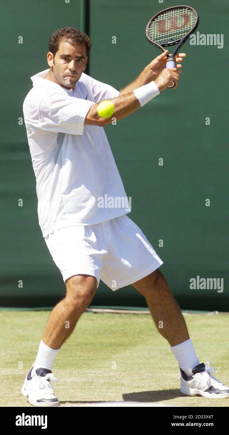 Seven times Wimbledon Champion Pete Sampras in action against the un-seeded Swiss tennis player George Bastl on Court Two at The All England Lawn Tennis Club. Stock Photo