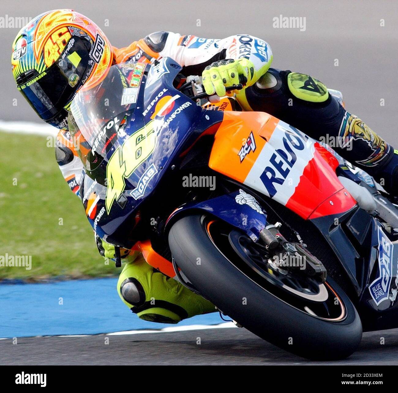 Italy's Valentino Rossi on his Honda, takes a corner during the MotoGP free  practice for The British Motorcycle Grand Prix at Donington, Leicestershire  Stock Photo - Alamy