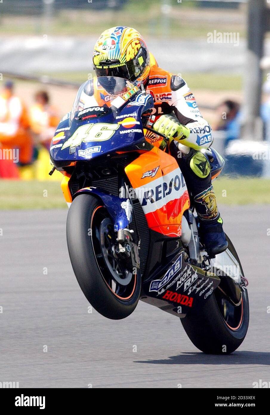Italy's Valentino Rossi of Honda pulls a wheelie during the MotoGP free  practice for The British Motorcycle Grand Prix at Donington, Leicestershire  Stock Photo - Alamy