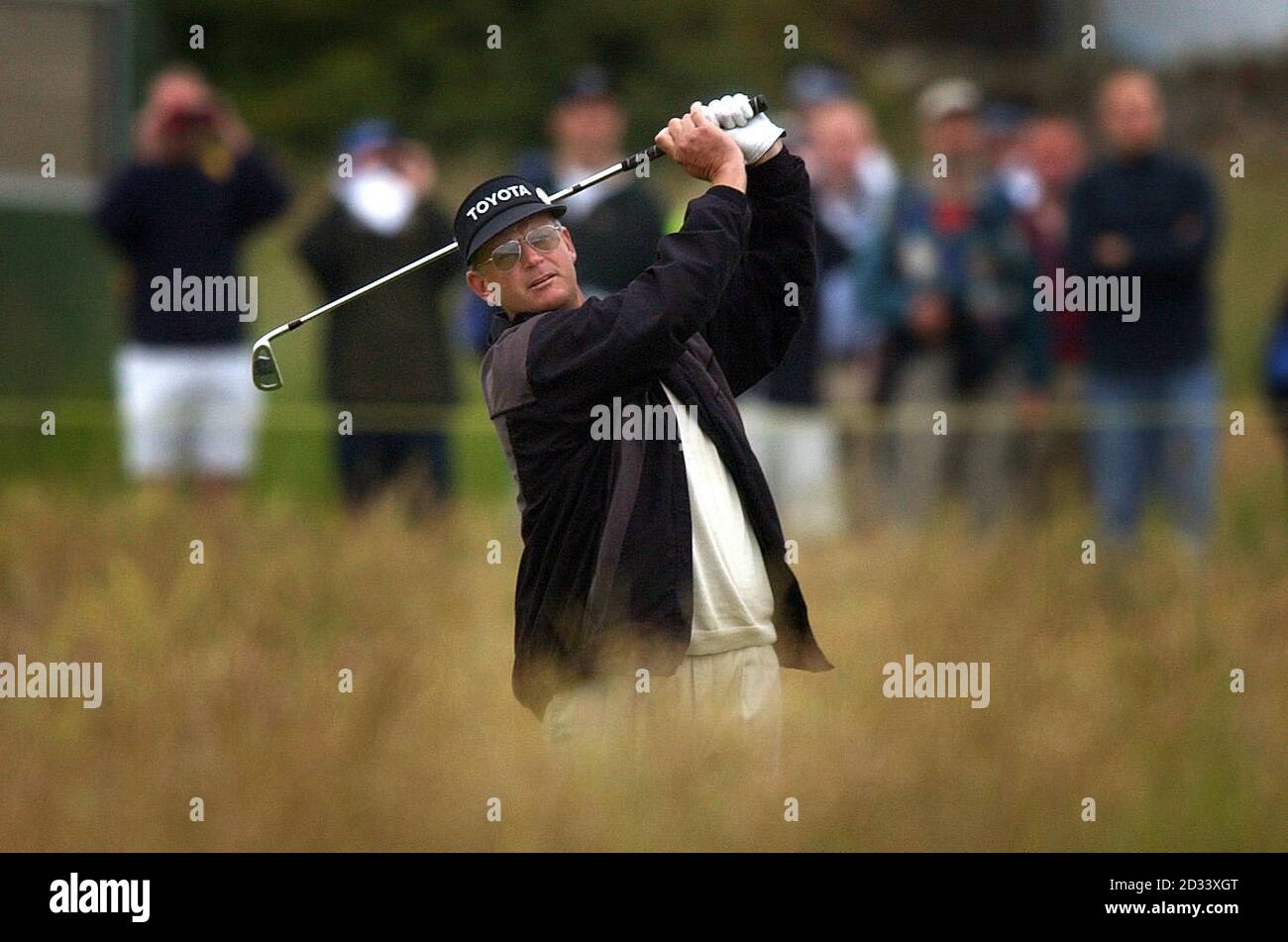 Scotland's Sandy Lyle plays a shot from the 1st fairway on the first day of the 131st Open Championship at Muirfield, Scotland.   Stock Photo