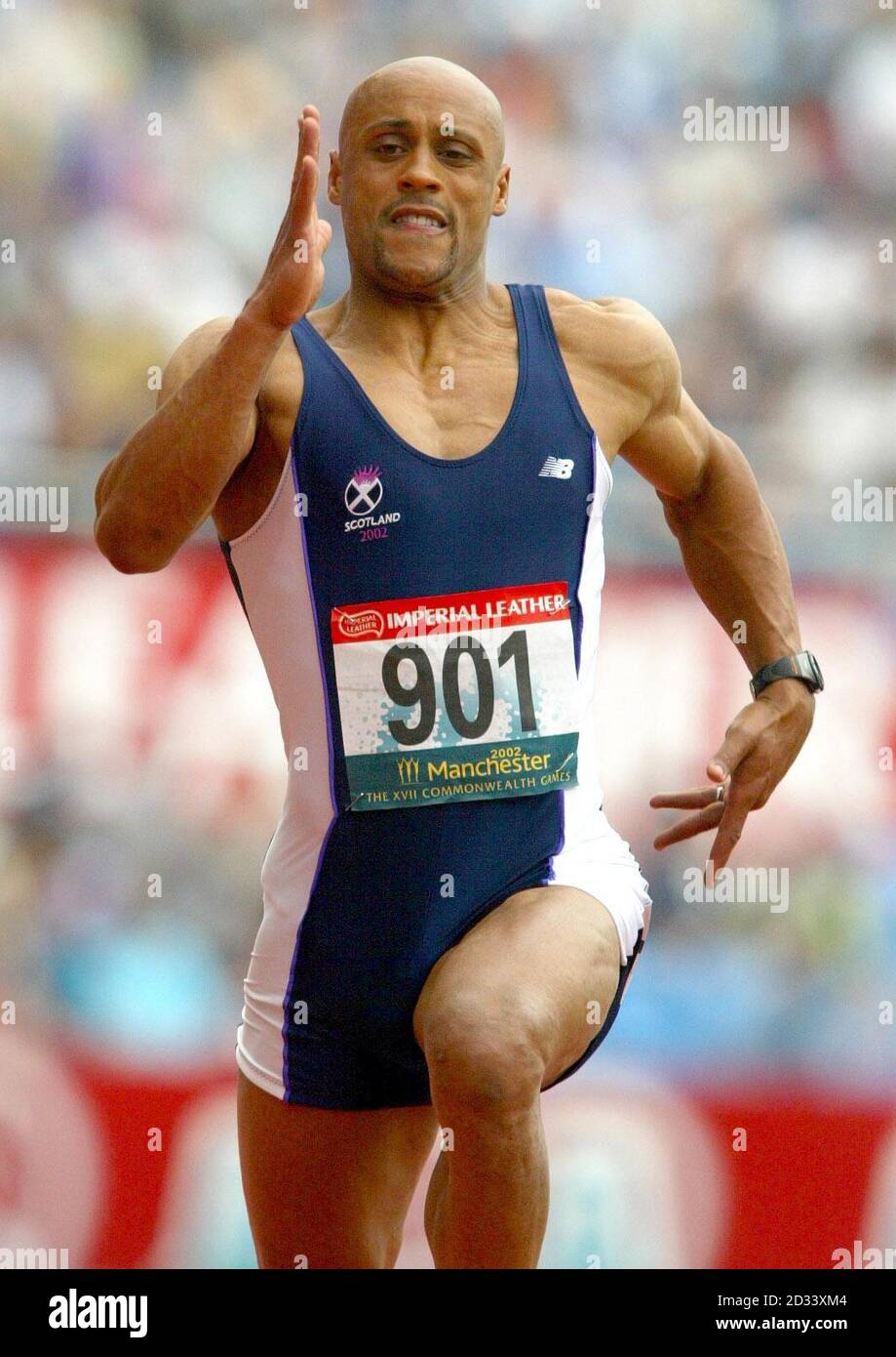 Scotland's Jamie Quarry in action during the Men's 100 m Decathlon event of the 2002 Commonwealth Games at the City of Manchester Stadium, Manchester. Stock Photo