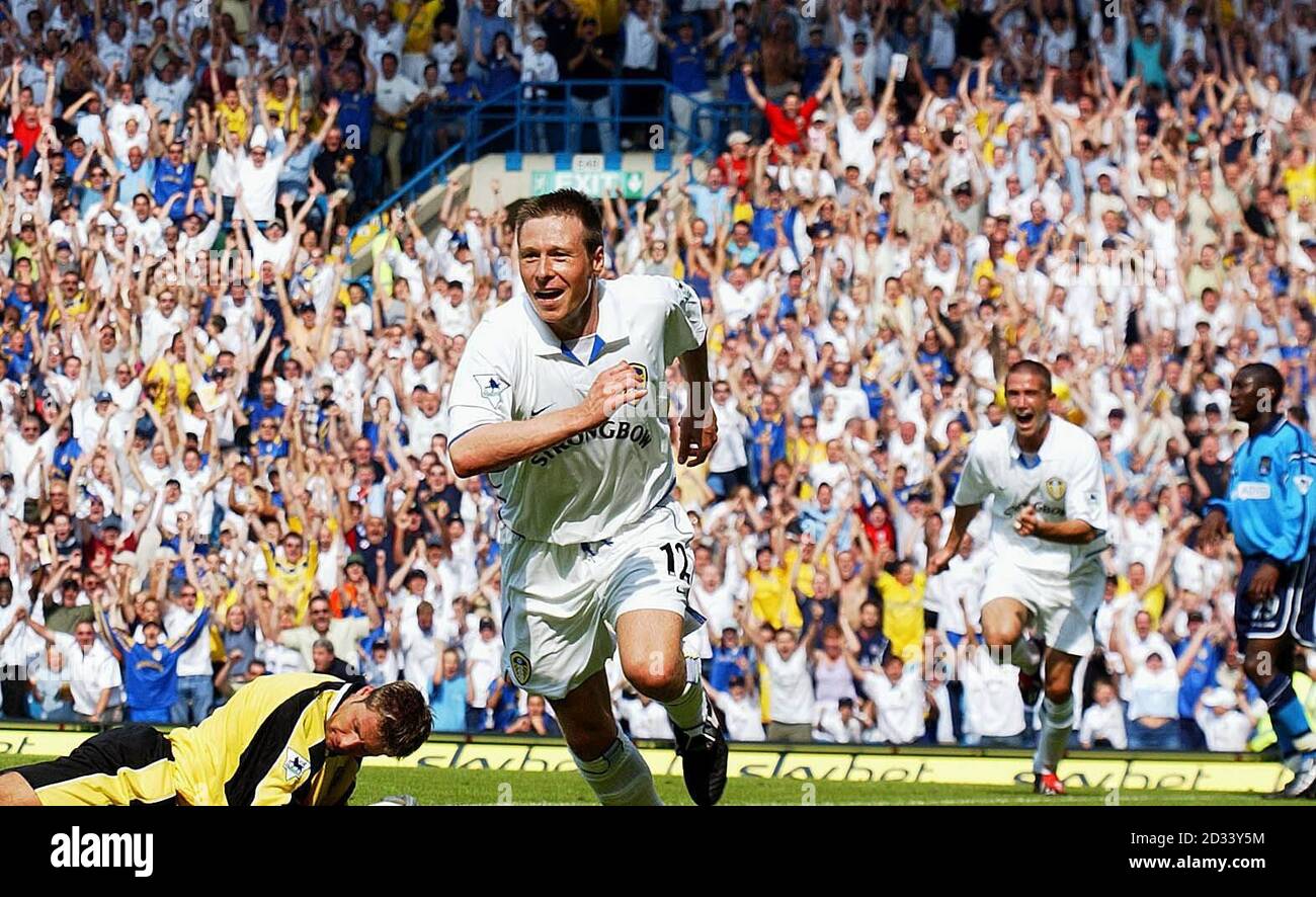 Leeds United debutant, Nick Barmby (centre) runs away to celebrate the opening goal against Manchester City, during the FA Barclaycard Premiership match at Leeds' Elland Road ground. THIS PICTURE CAN ONLY BE USED WITHIN THE CONTEXT OF AN EDITORIAL FEATURE. NO WEBSITE/INTERNET USE UNLESS SITE IS REGISTERED WITH FOOTBALL ASSOCIATION PREMIER LEAGUE. Stock Photo