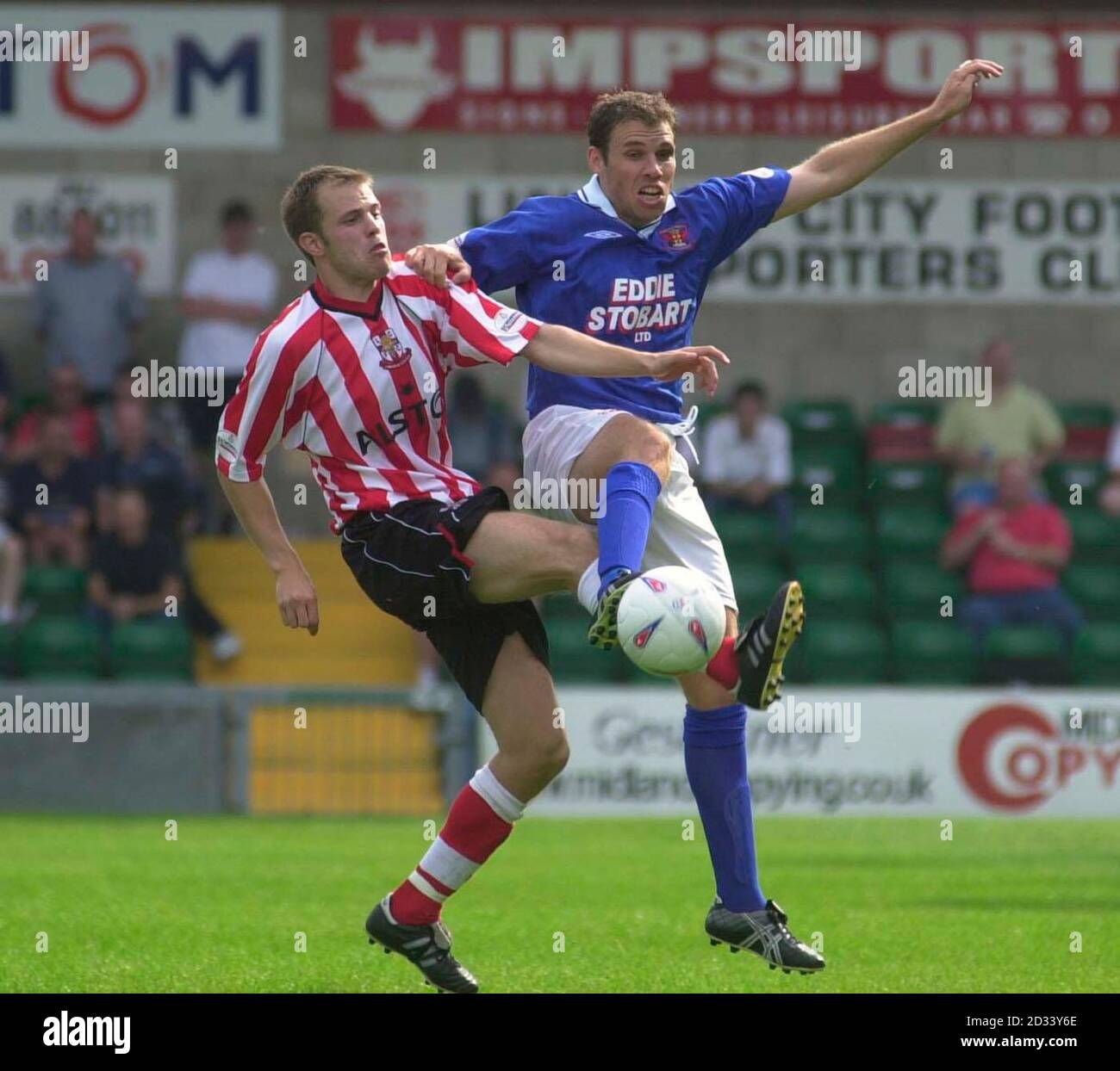 Lincoln's Paul Smith (left) and Carlisle's Lee Madison in action, during  their Nationwide Division Three match at Lincoln's Sincil Bank ground.  Carlisle beat Lincoln 1-0. THIS PICTURE CAN ONLY BE USED WITHIN