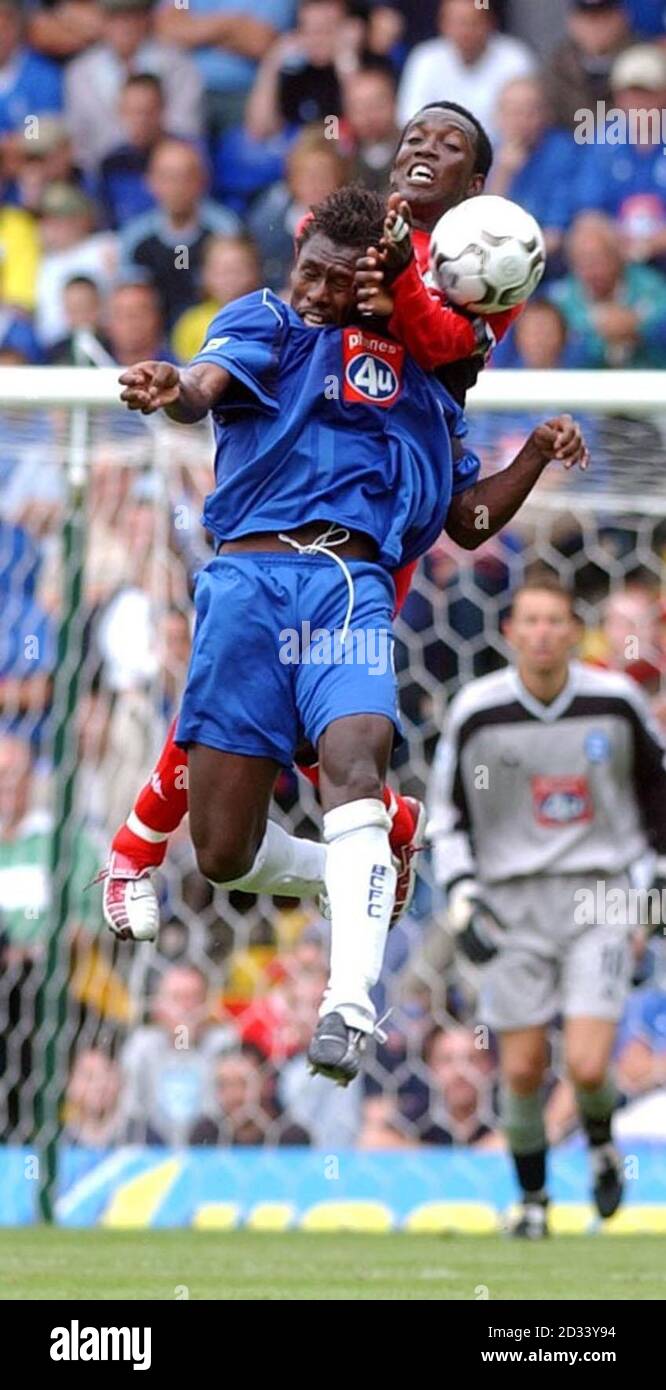 Aliou Cisse in action with Dwight Yorke (front) , during their FA Barclaycard Premiership match at Birmingham's St Andrew's ground. Stock Photo