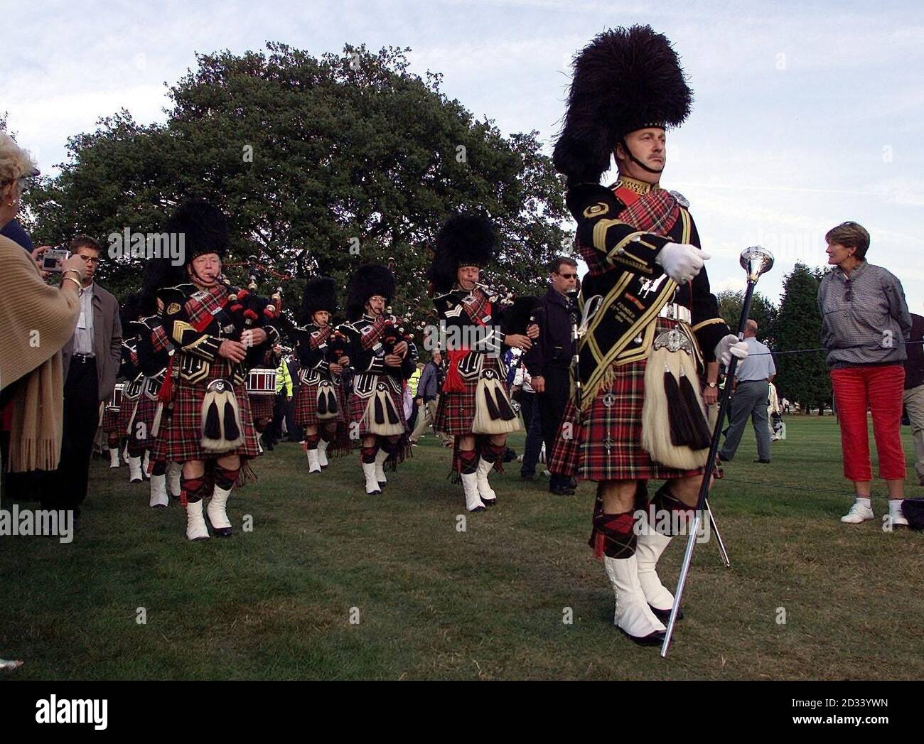 The Nottinghamshire Police Pipe Band lead the two teams out to the opening ceremony of the Ryder Cup at the Belfry near Sutton Coldfield, West Midlands. Stock Photo