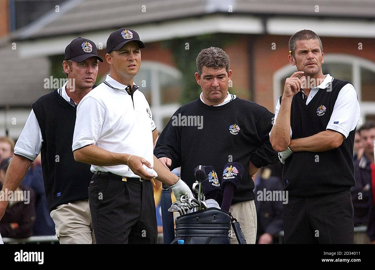 From L-R) Caddie Lance Tenbroeck, European player Niclas Fasth 
