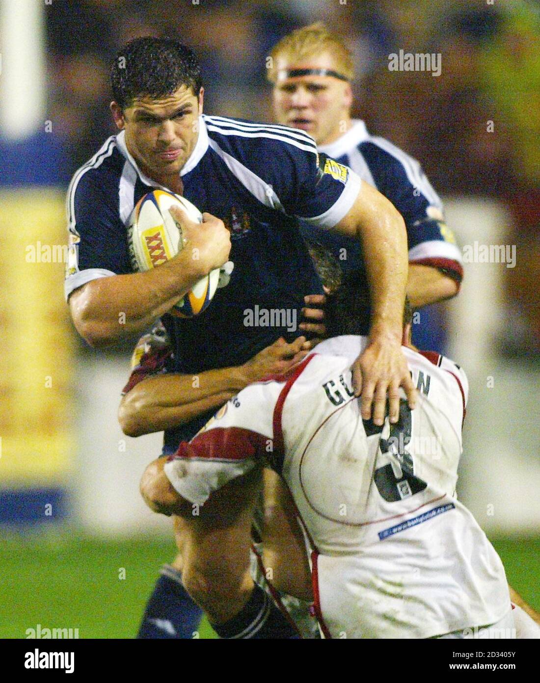 Wigan Warriors' Andy Farrell (left) is tackled by St Helens' Martin Gleeson during the Tetley's Super League semi-final match at Knowsley Road. Stock Photo