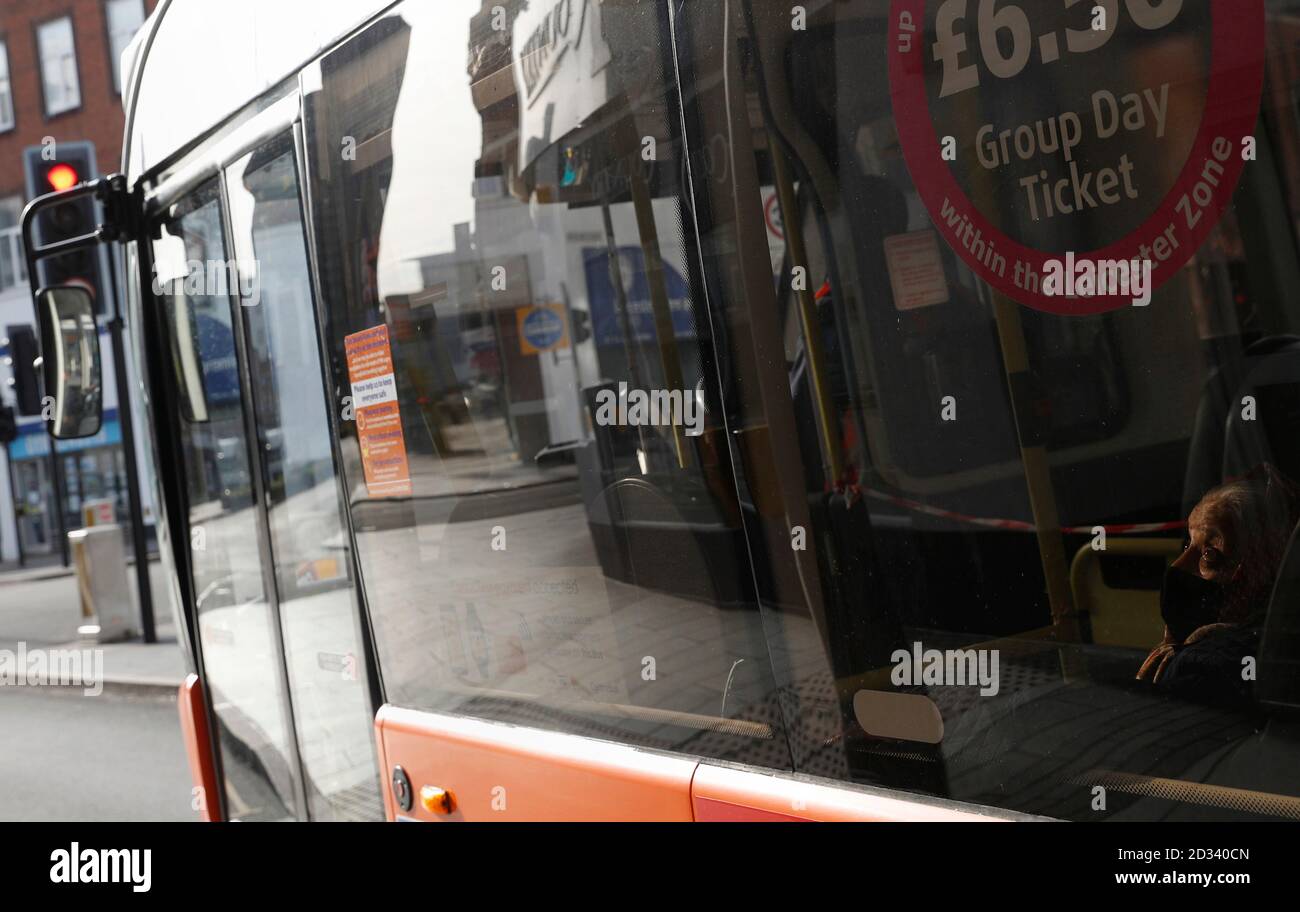 Leicester, Leicestershire, UK. 7th October 2020. A woman travels on a bus 100 days since the UKÕs first local coronavirus pandemic lockdown was announced in the city. Credit Darren Staples/Alamy Live News. Stock Photo