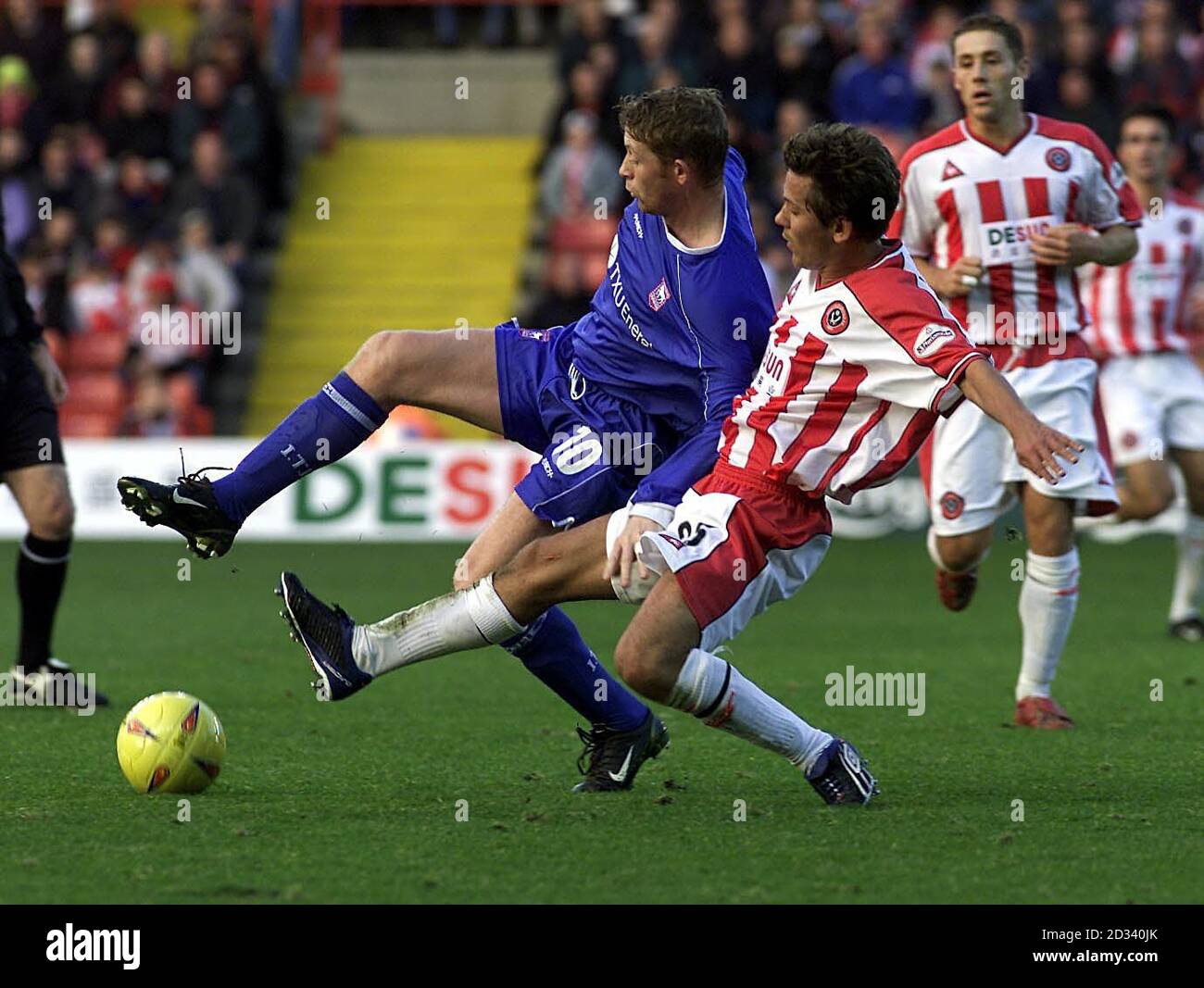 Jon Harley (right) of Sheffield United in action with Ipswich Town's Alun Armstrong, during their Nationwide Division One match at United's Bramall Lane ground. THIS PICTURE CAN ONLY BE USED WITHIN THE CONTEXT OF AN EDITORIAL FEATURE. NO UNOFFICIAL CLUB WEBSITE USE. Stock Photo