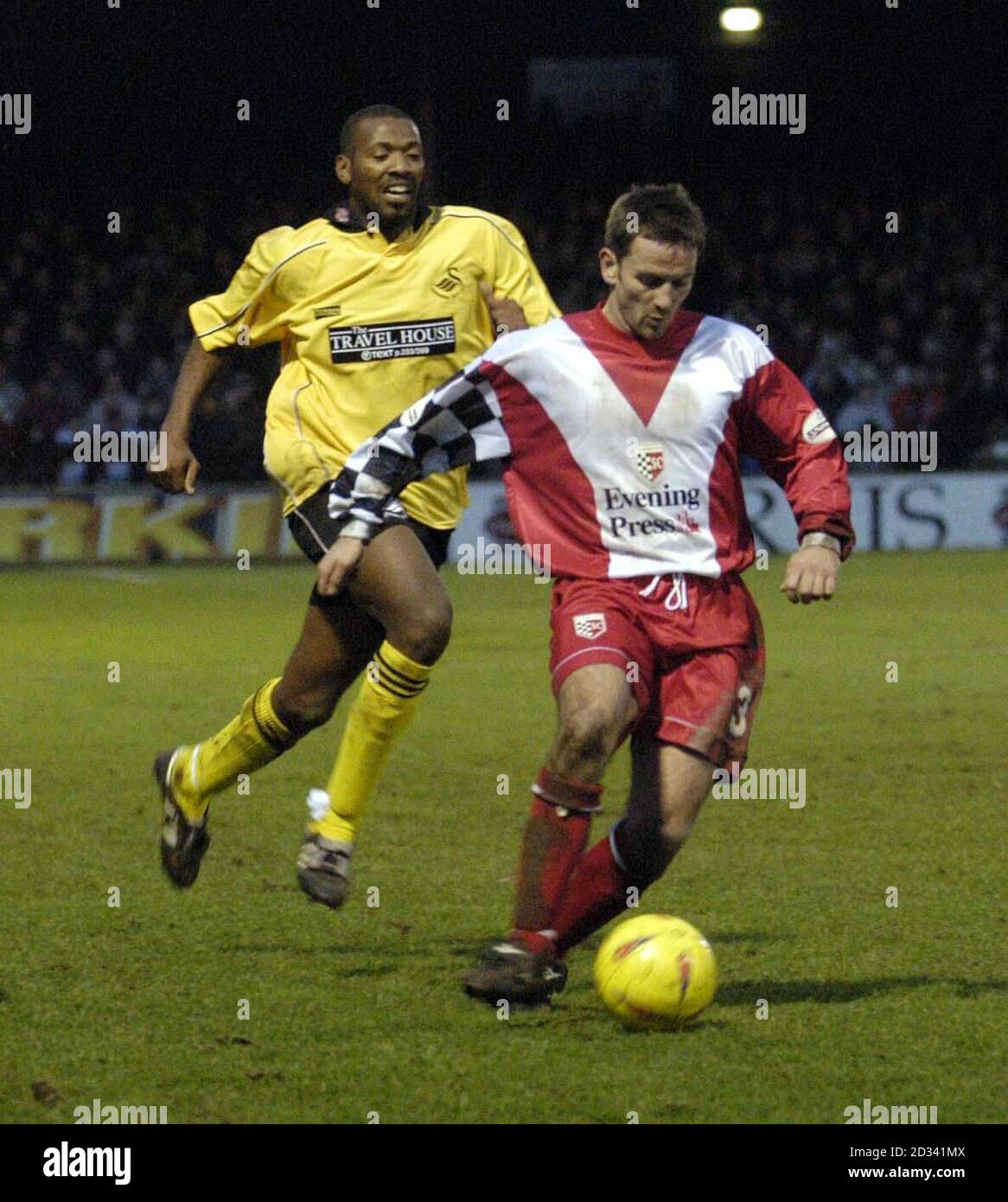 York City's Tom Cowan (right) in action against Swansea's John Williams during their Nationwide Division Three match at Bootham Crescent. York City defeated Swansea 3-1.  THIS PICTURE CAN ONLY BE USED WITHIN THE CONTEXT OF AN EDITORIAL FEATURE. NO UNOFFICIAL CLUB WEBSITE USE. Stock Photo