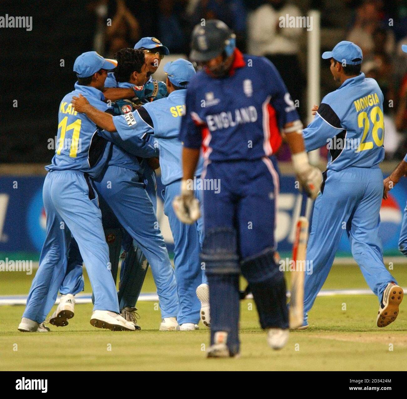 EDITORIAL USE ONLY - NO COMMERCIAL SALES: The Indian team celebrate after  England captain Nasser Hussain was caught by Rahul Dravid for 15 runs off  the bowling of Ashish Nehra during their